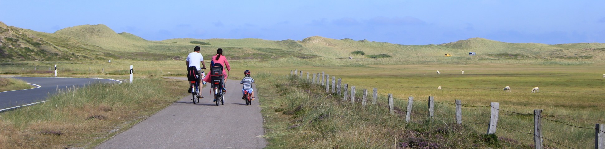 Riding bikes with family in a hilly terrain