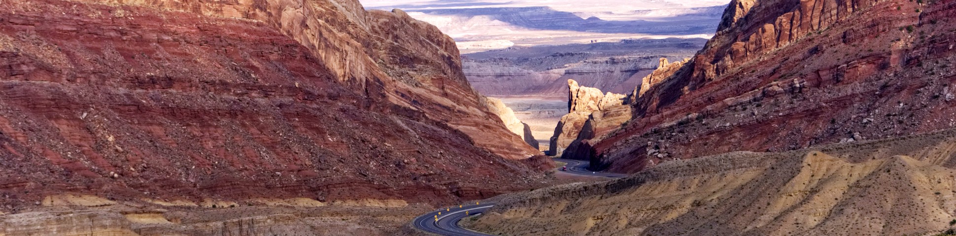 Windy road among the red rock formations in Utah