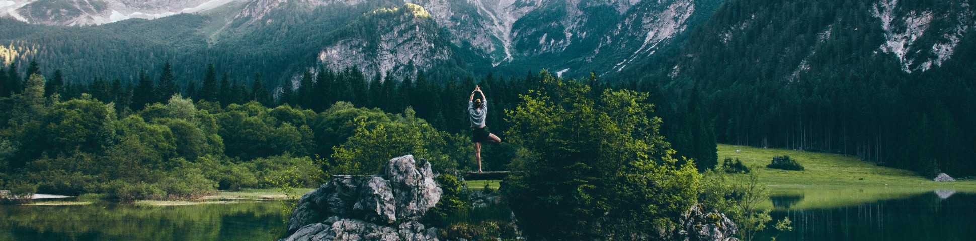 Lady doing Yoga in wilderness