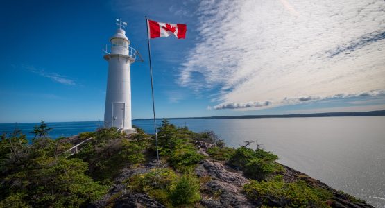 Flag near the lighthouse in Newfoundland