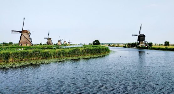 Windmills along the channel in Netherlands