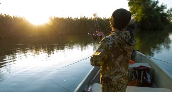 Boy fishing in a lake