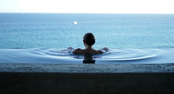 Lady in a swimming pool, Wellness Tours