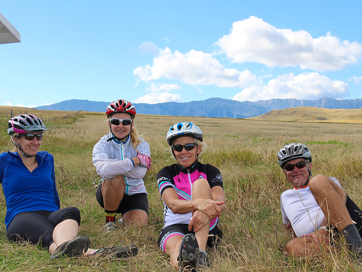 Happy bikers resting on guided cycling tour from Jasper to Banff in Canada