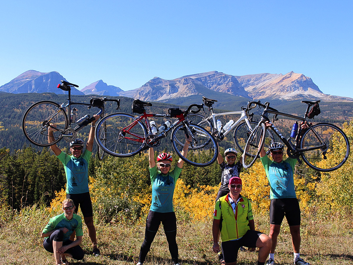 Happy bikers on guided cycling tour from Jasper to Banff in Canada