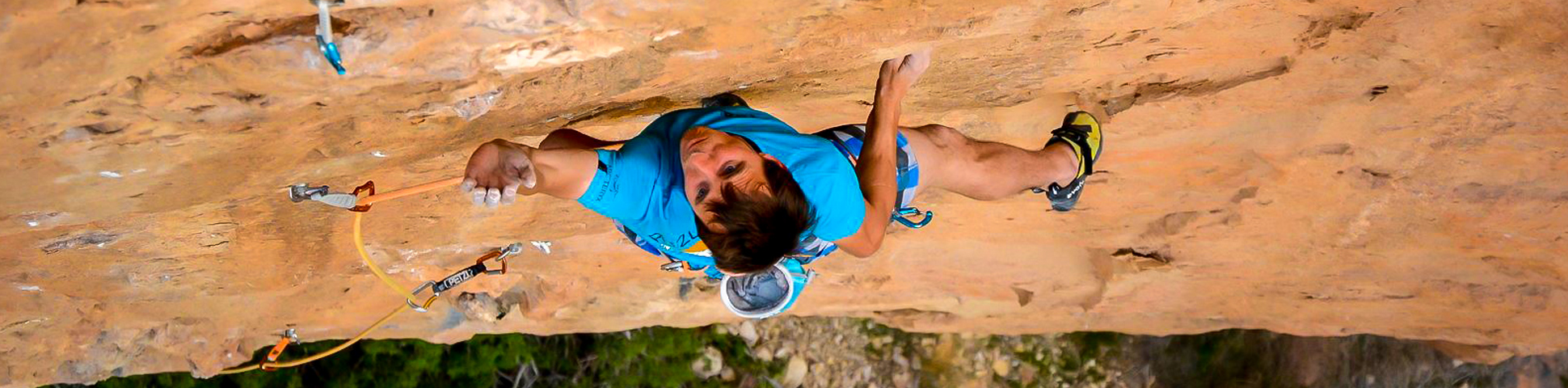 Climber on a steep rock wall