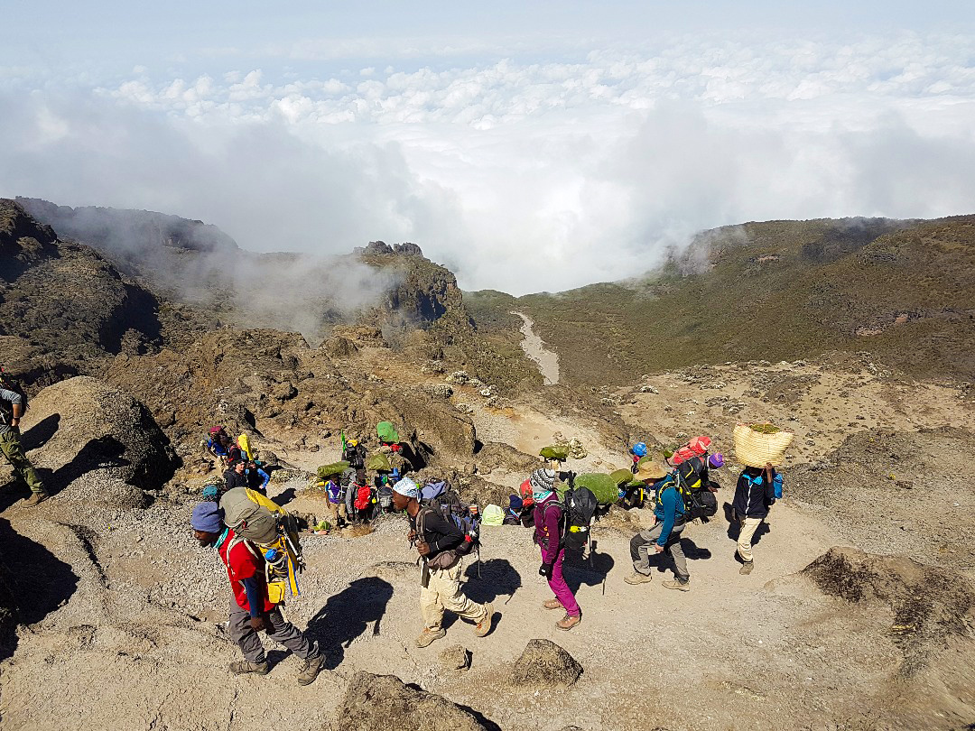 Group of hikers on Kilimanjaro trek on Machame Route in Tanzania