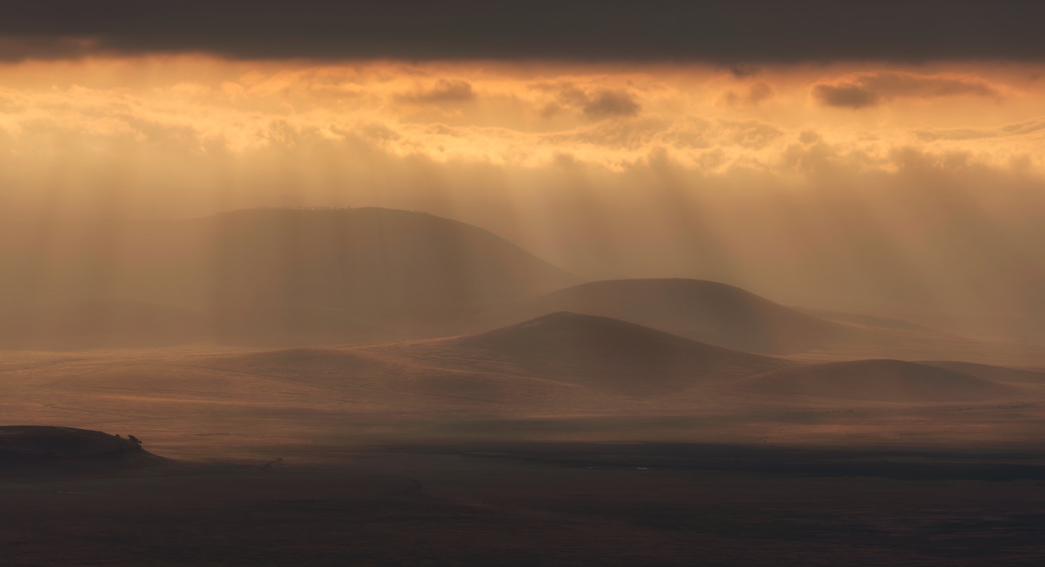 Beautiful dusk over Tanzanian countryside on guided cycling tour around Mount Kilimanjaro in Tanzania