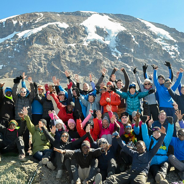 Happy climbers on Kilimanjaro trek on Lemosho Route in Tanzania