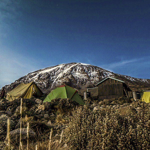 Snowy campgrounds on Kilimanjaro trek on Lemosho Route in Tanzania