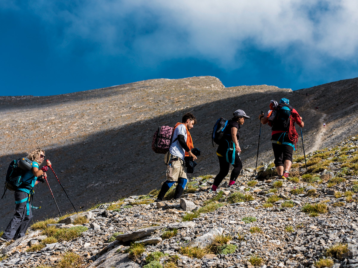 Hikers ascending to the top of Mount Olympus on guided climb to Mount Olympus, Greece