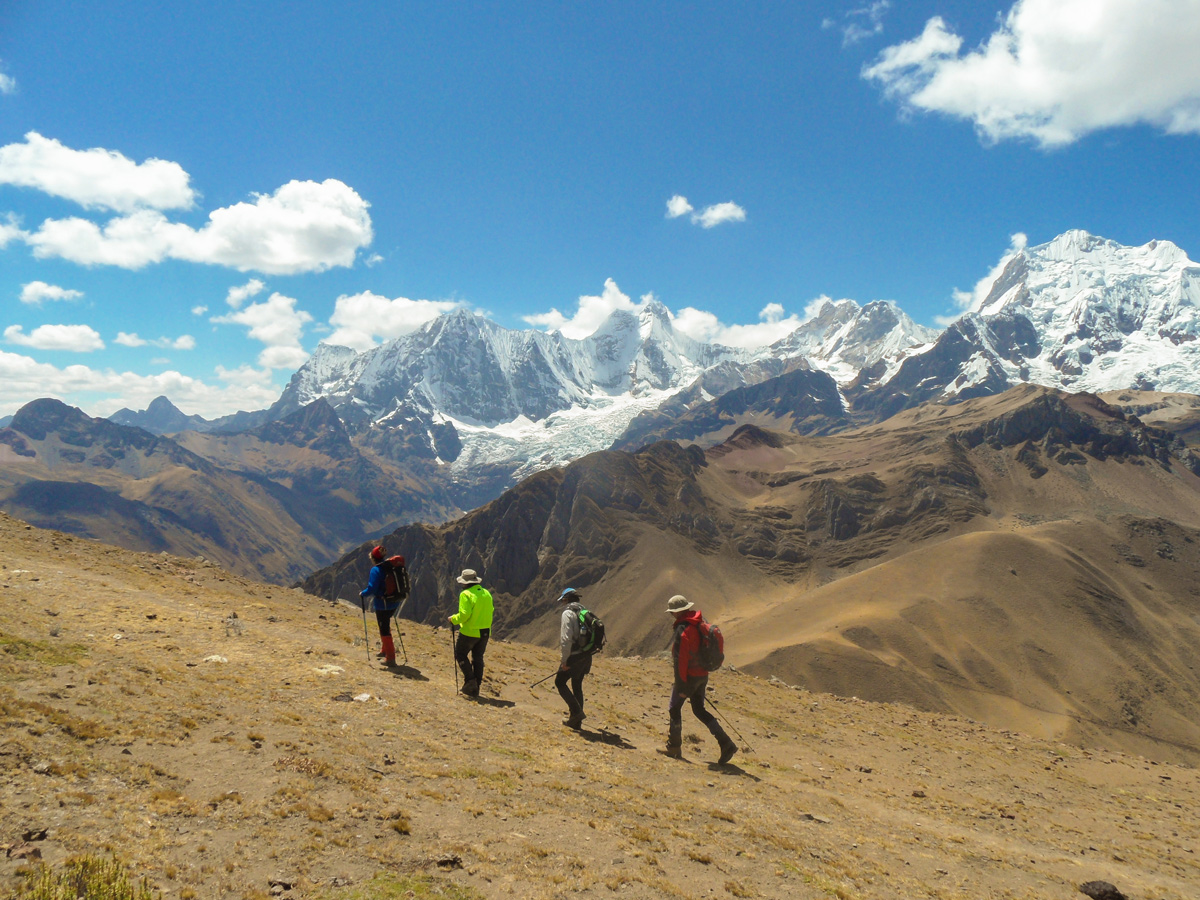 Four hikers trekking on Huayhuash circuit trek, Peru