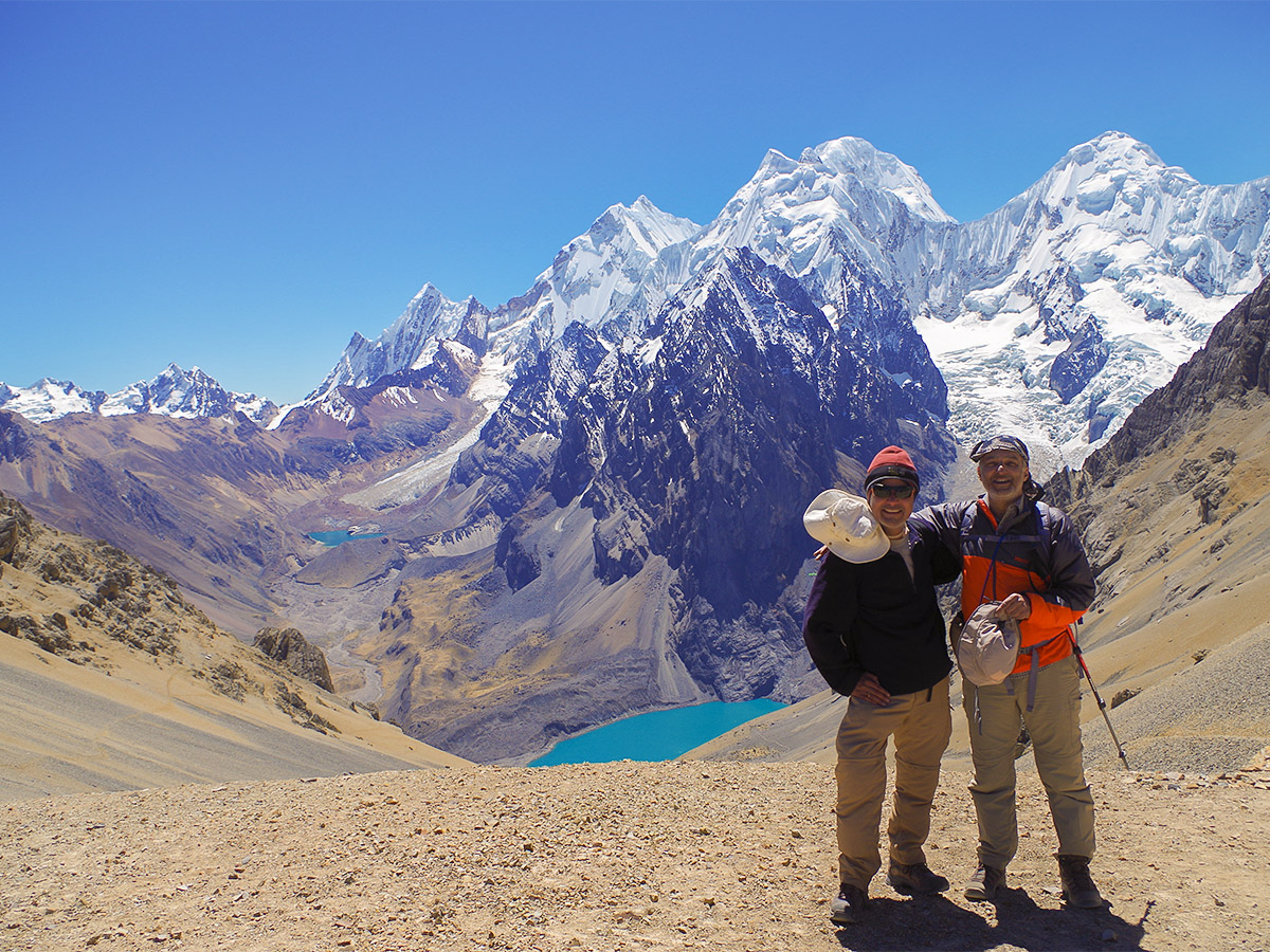 Hiker with a guide on Huayhuash circuit trek, Peru