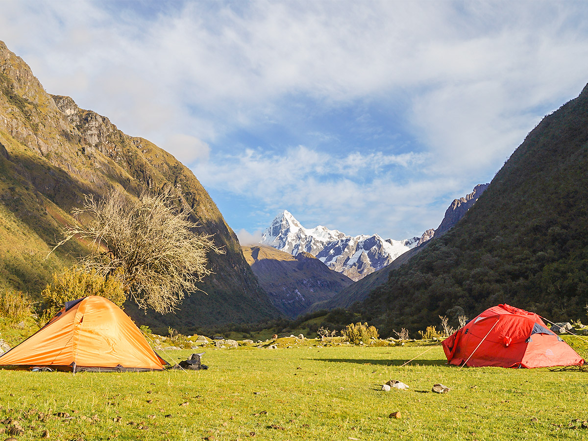 Campsites with beautiful view of Peruvian Andes on Santa Cruz trek