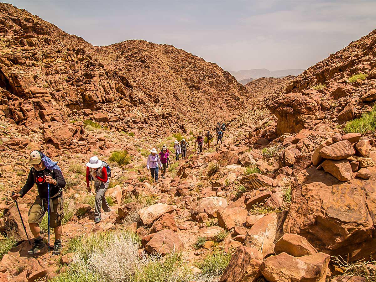 Group with guide on Dana to Petra Trekking Tour in Jordan