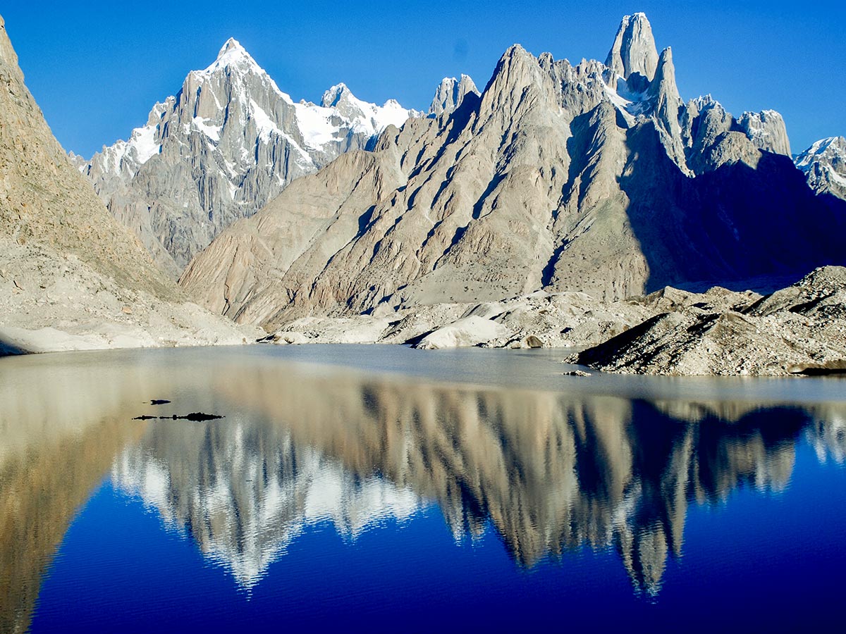 Glacier Lake in front of Paiju Peak and Uli Biaho Tower on K2 Base Camp and Gondogoro La Trek in Pakistan