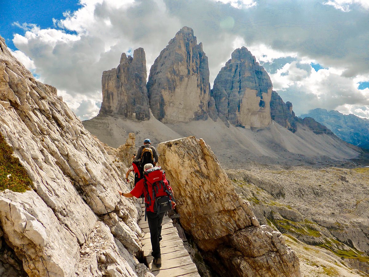 Group trekking on Dolomites Haute Route Trek in Italy