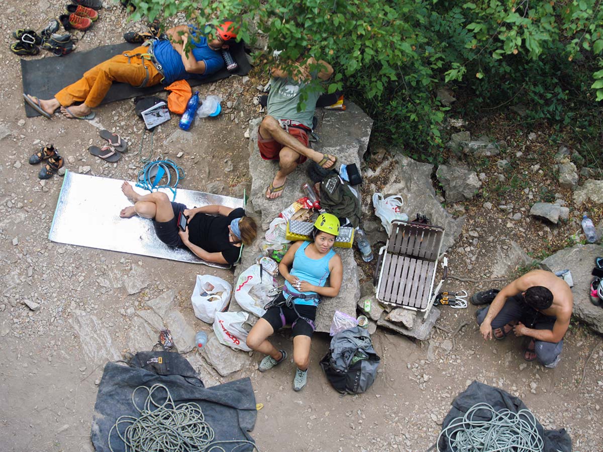 Tired climbers near Finale Ligure on climbing camp in Italian Riviera