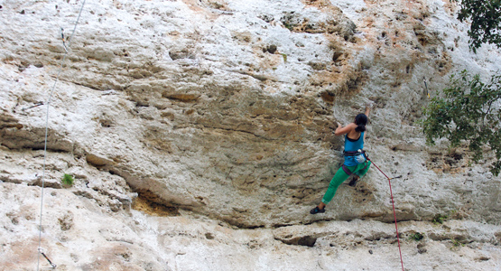 Climber on rock climbing camp in Finale Ligure rock climbing camp in Italian Riviera