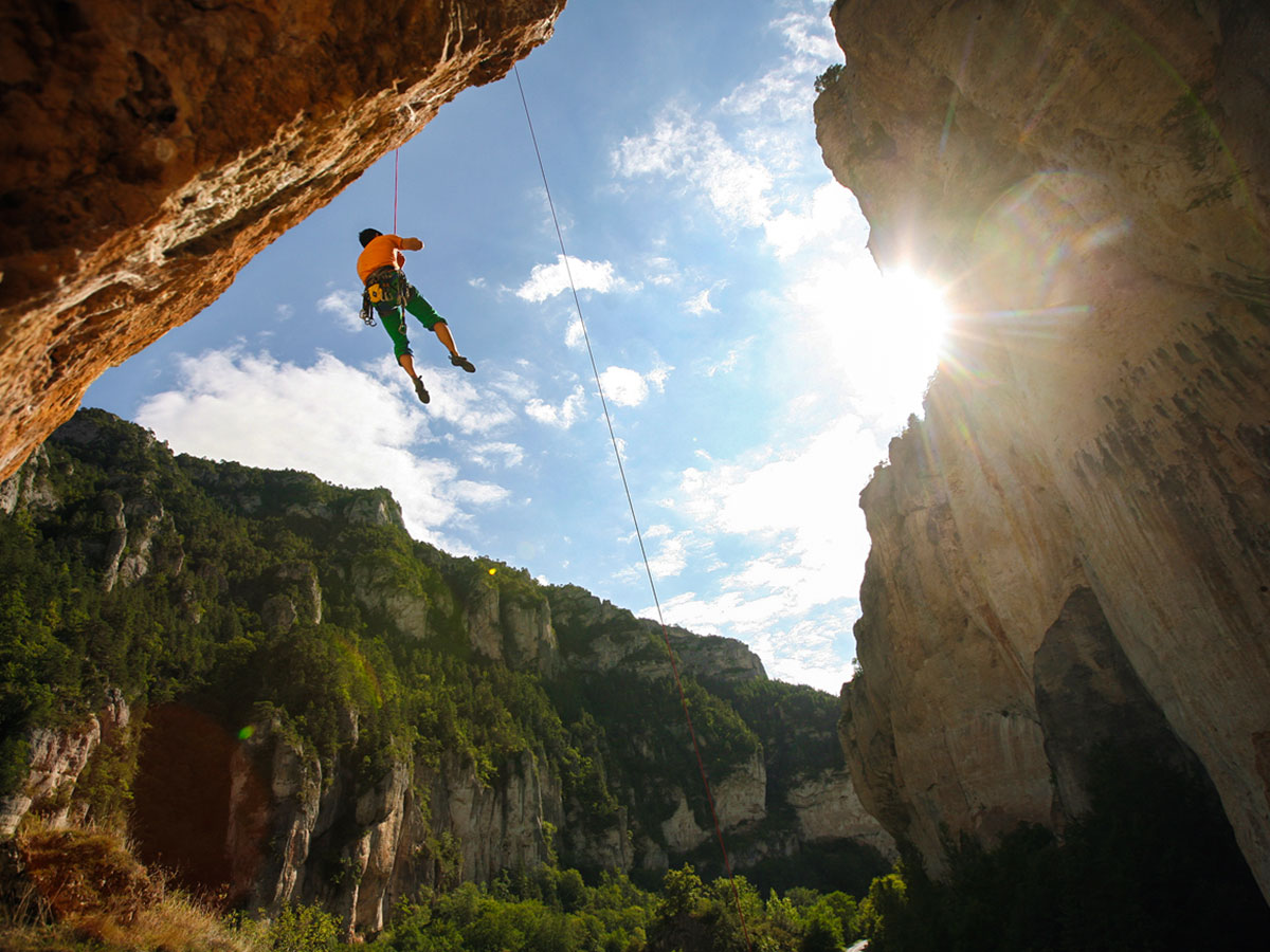 Climbers on rock on climbing camp at Gorges du Tarn in France