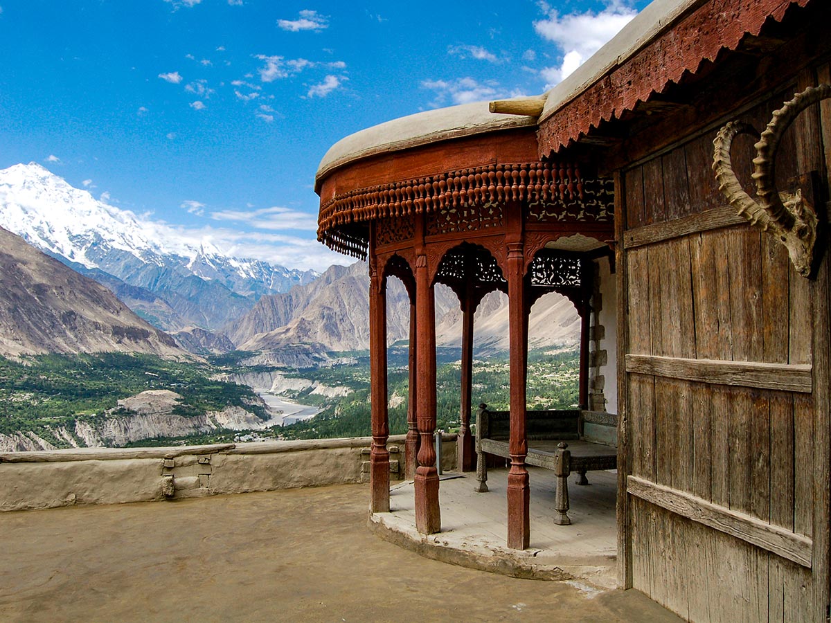 Baltit Fort in front of Rakaposhi Mountains on Hanza Valley Overland Tour in Pakistan