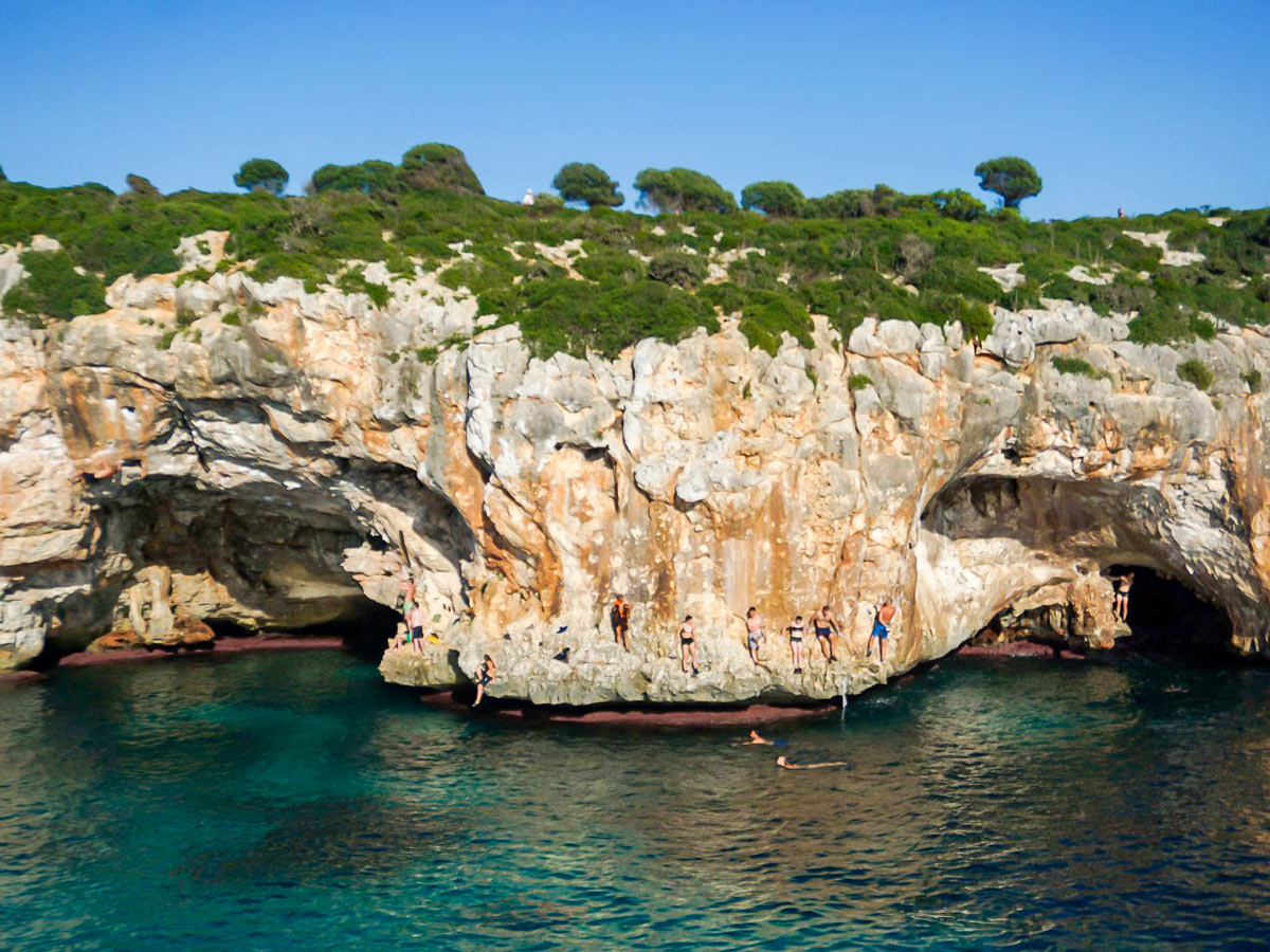 Group of rock climbers enjoying the water on DWS camp in Mallorca