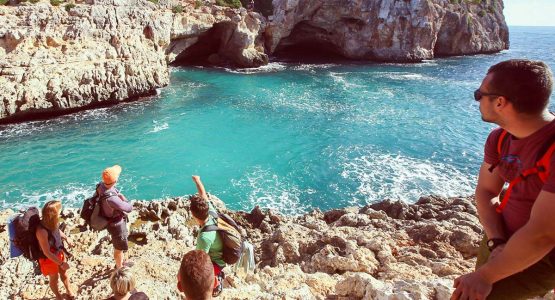 Group of climber before the deep water solo climbing tour in Mallorca, Spain