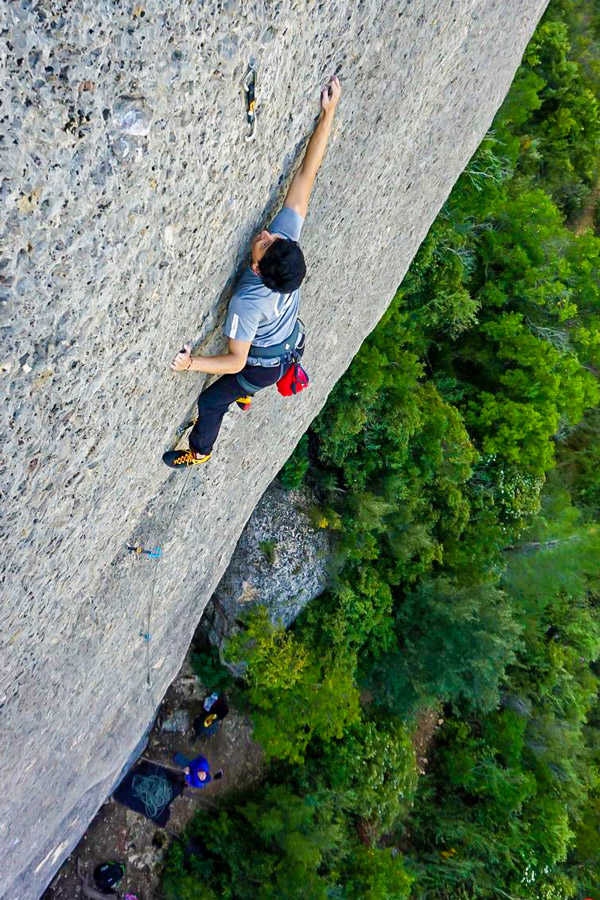 Man climbing in Margalef on guided climbing camp in Spain