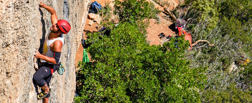 Climber on rock climbing tour in Margalef, Spain