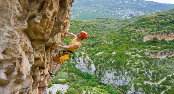 Rock climber in Rodellar on climbing tour with Klemen Bečan