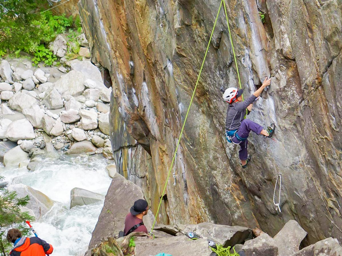 Climbing above a raging river in Zillertal near Mayrhofen