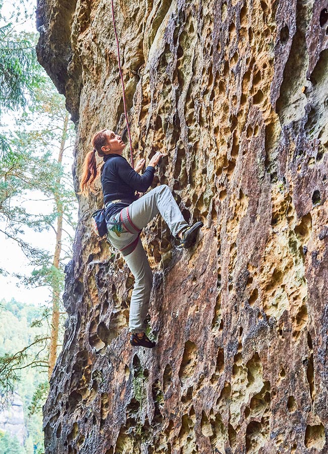 Climber on vertical wall in Labske Udoli