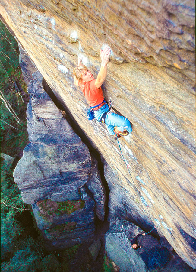 Woman on rock climbing tour in Czech Republic