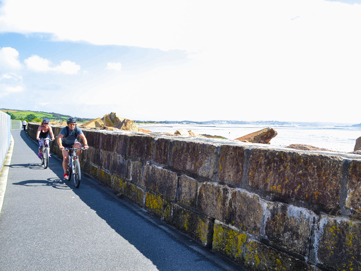 Cornwall cycling along coastal wall