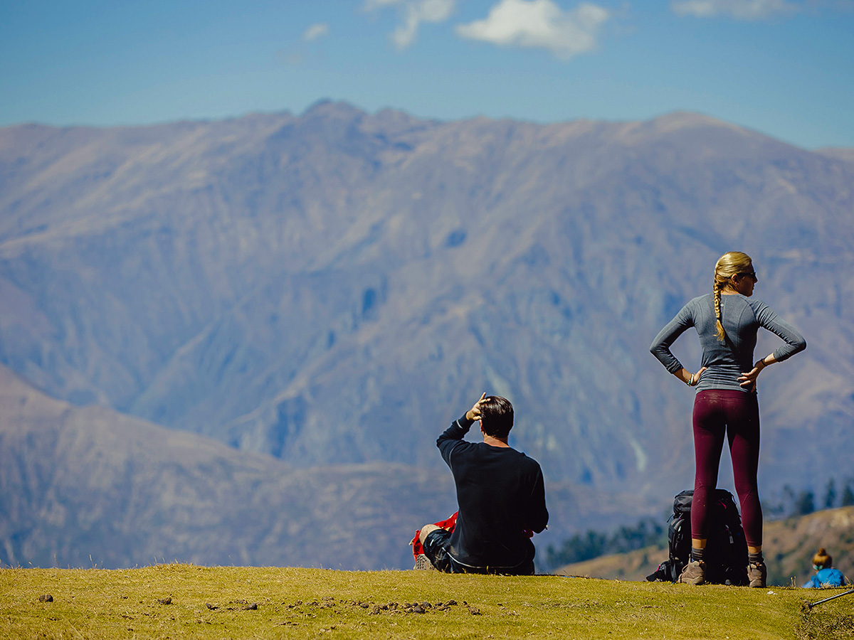 Hikers enjoying the views on Salkantay Trek to Machu Picchu in Peru