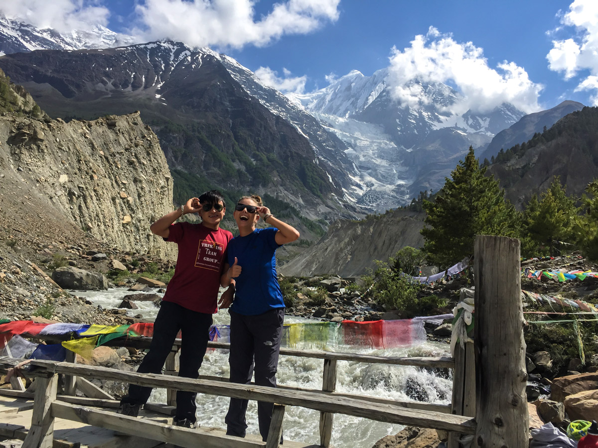 Hikers posing near Annapurna Massif on guided Annapurna Circuit hike in Nepal