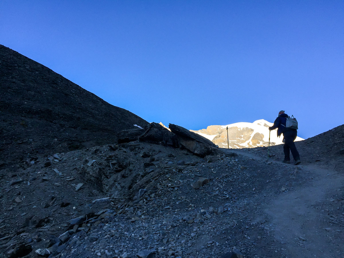 Hiker ascending on Annapurna Circuit trek in Nepal