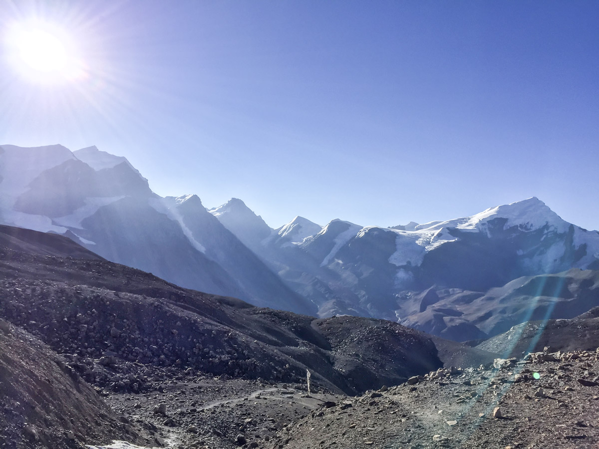 Sun over the peaks on Annapurna Circuit trek in Nepal