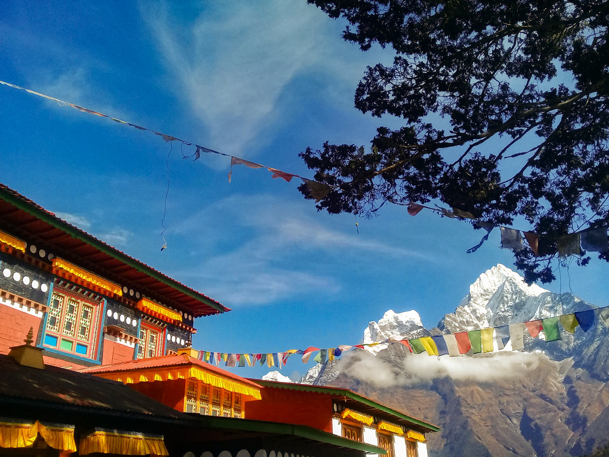 Prayer flag lodge and mountain views on Everest Base Camp trek in Nepal