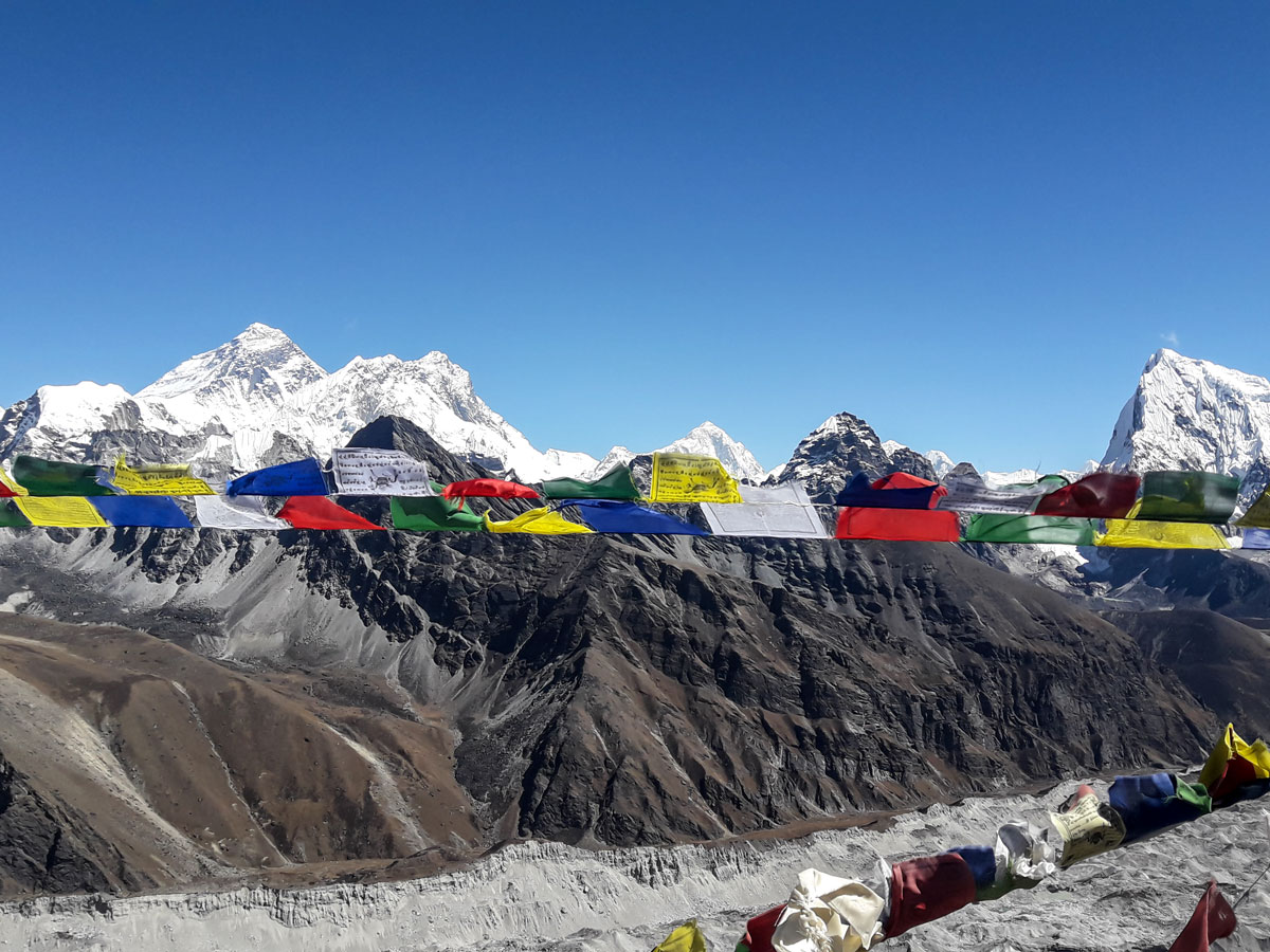 Prayer flag and Himalayan Mountains on Everest Base Camp and Gokyo Lake trek in Nepal