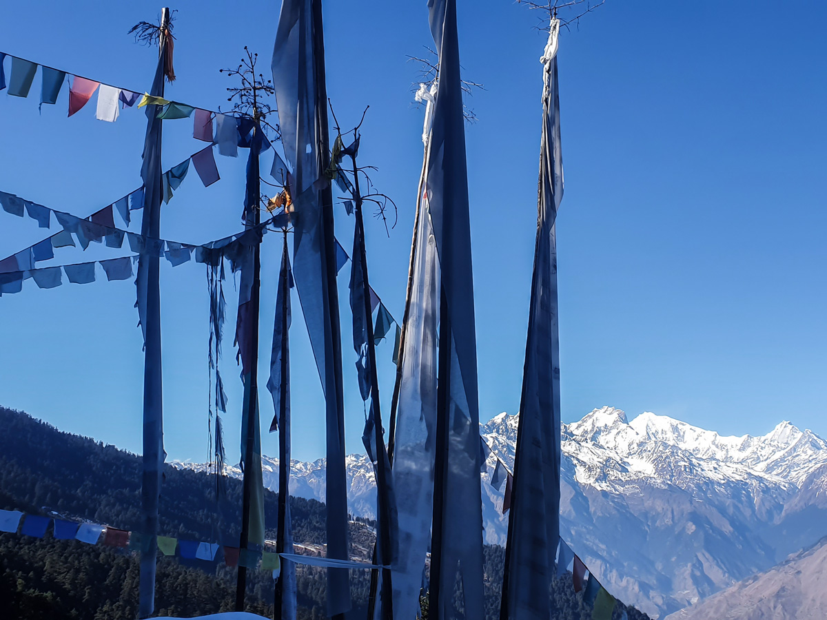 Himalaya mountains and prayer flags on guided Langtang Trek in Nepal