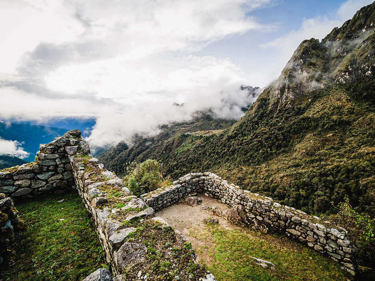 Looking down on the valley from Incan ruins on Inca Trail to Machu Picchu near Cusco Peru