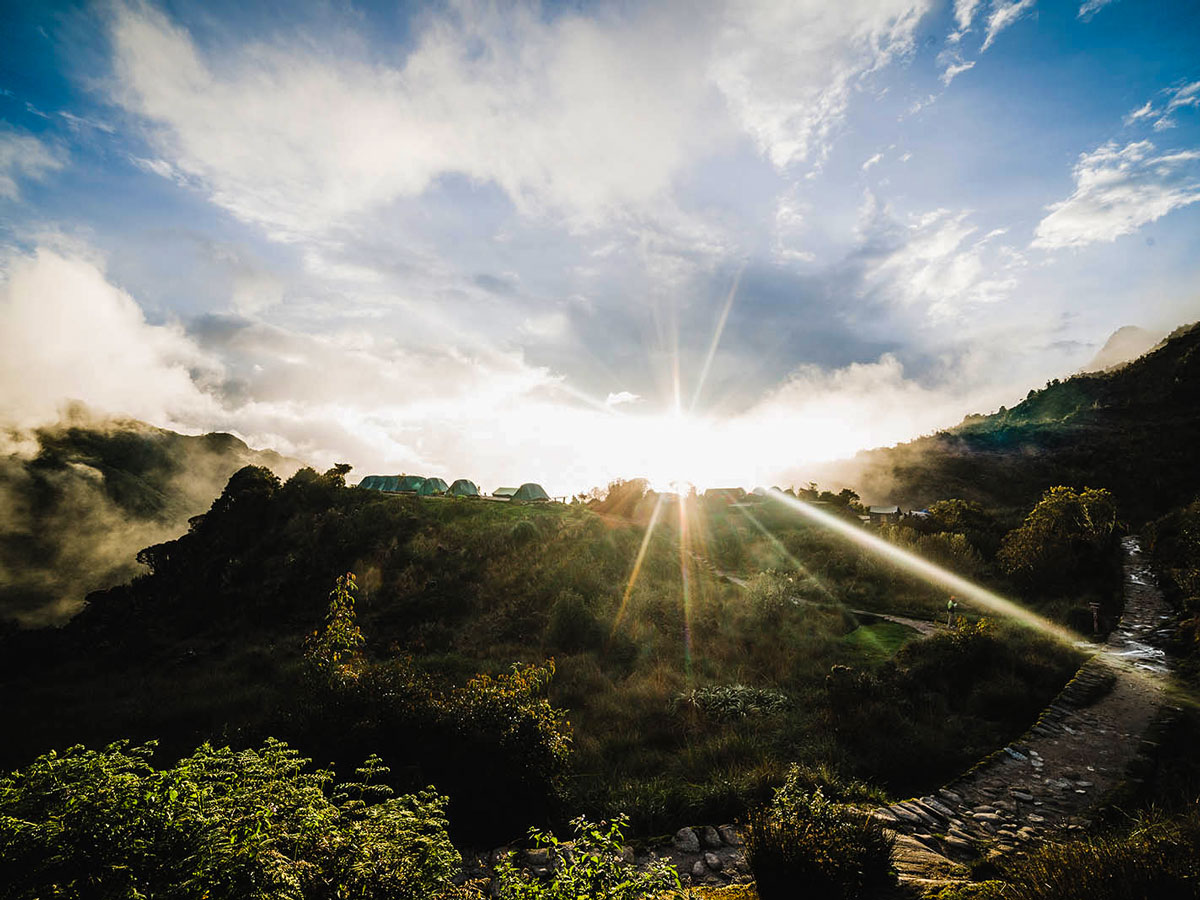 Sun shining on the trail of Inca Trail to Machu Picchu near Cusco Peru