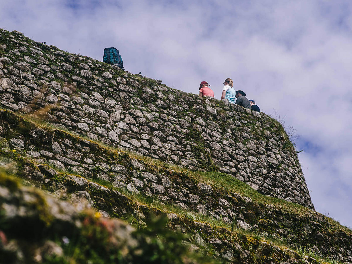 Hikers-resting-on-Inca-Trail-to-Machu-Picchu-near-Cusco-Peru.jpg