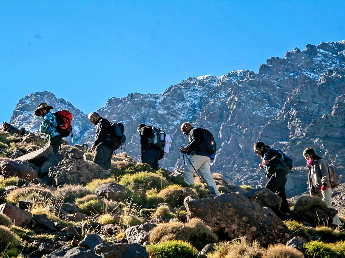 Group of hikers ascending on Mt Toubkal and Desert tour in Morocco