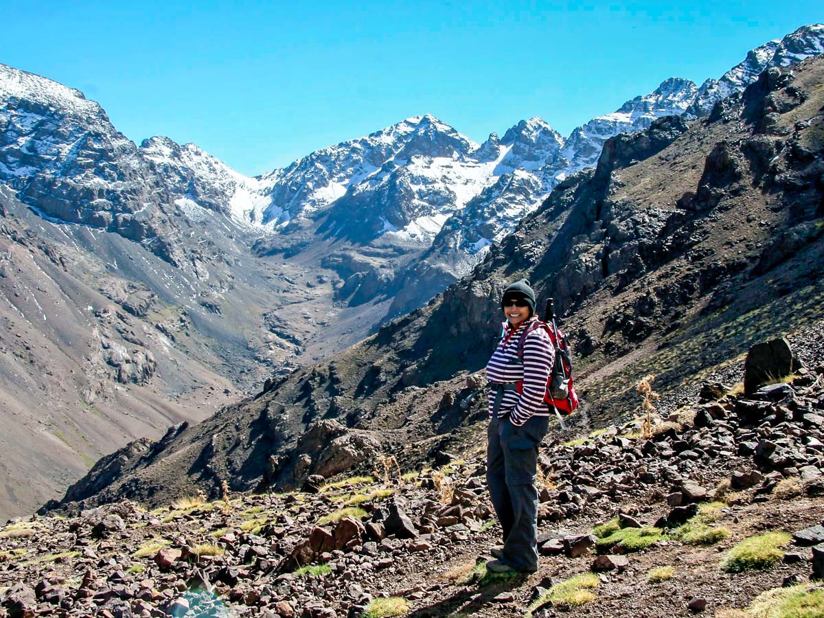 Hiker surrounded by peaks on Mt Toubkal and Desert tour in Morocco