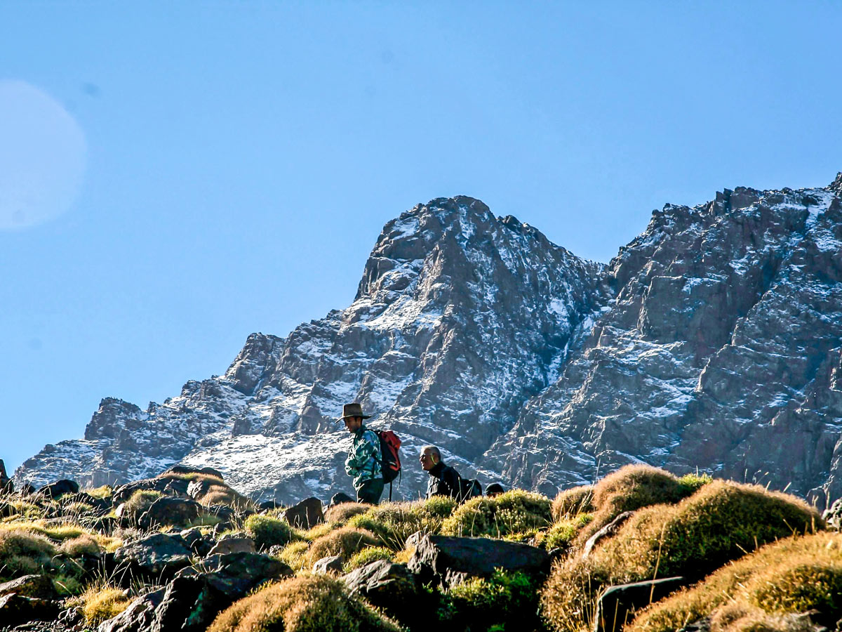 Surrounded by white peaks on Villages Valleys and Mt Toubkal Climb tour in Morocco