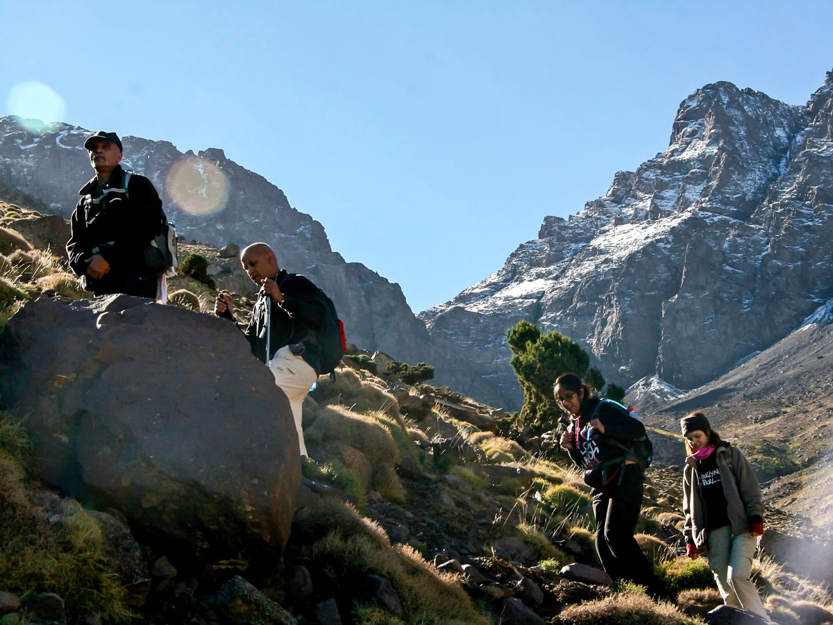 Group of hikers ascending on Mt Toubkal Circuit Trek in Morocco