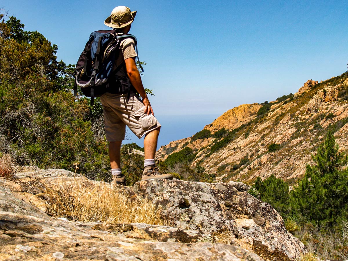 Hiker near Piana on Scala to Piana trek in Corsica