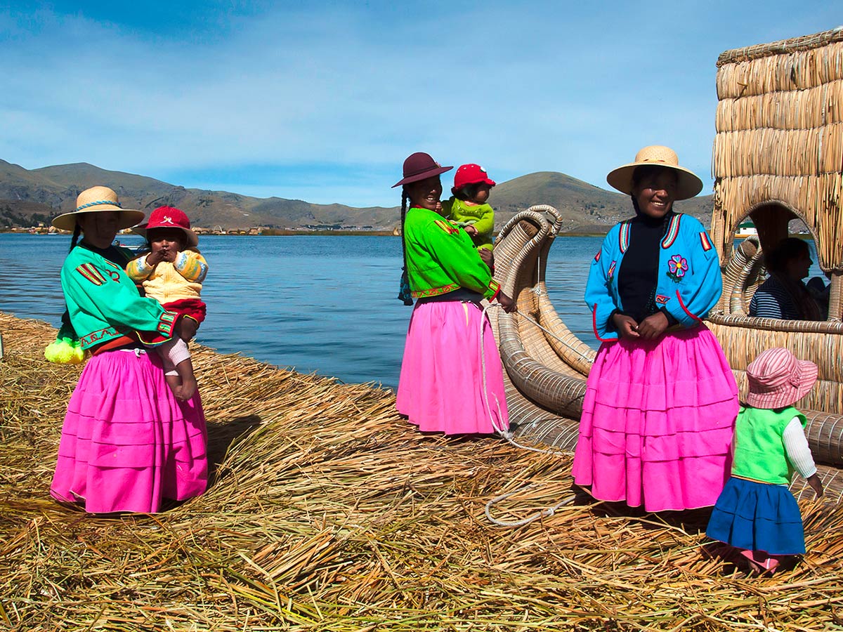 Local peruvian people wearing colorful outfits seen on Peru Active Tour